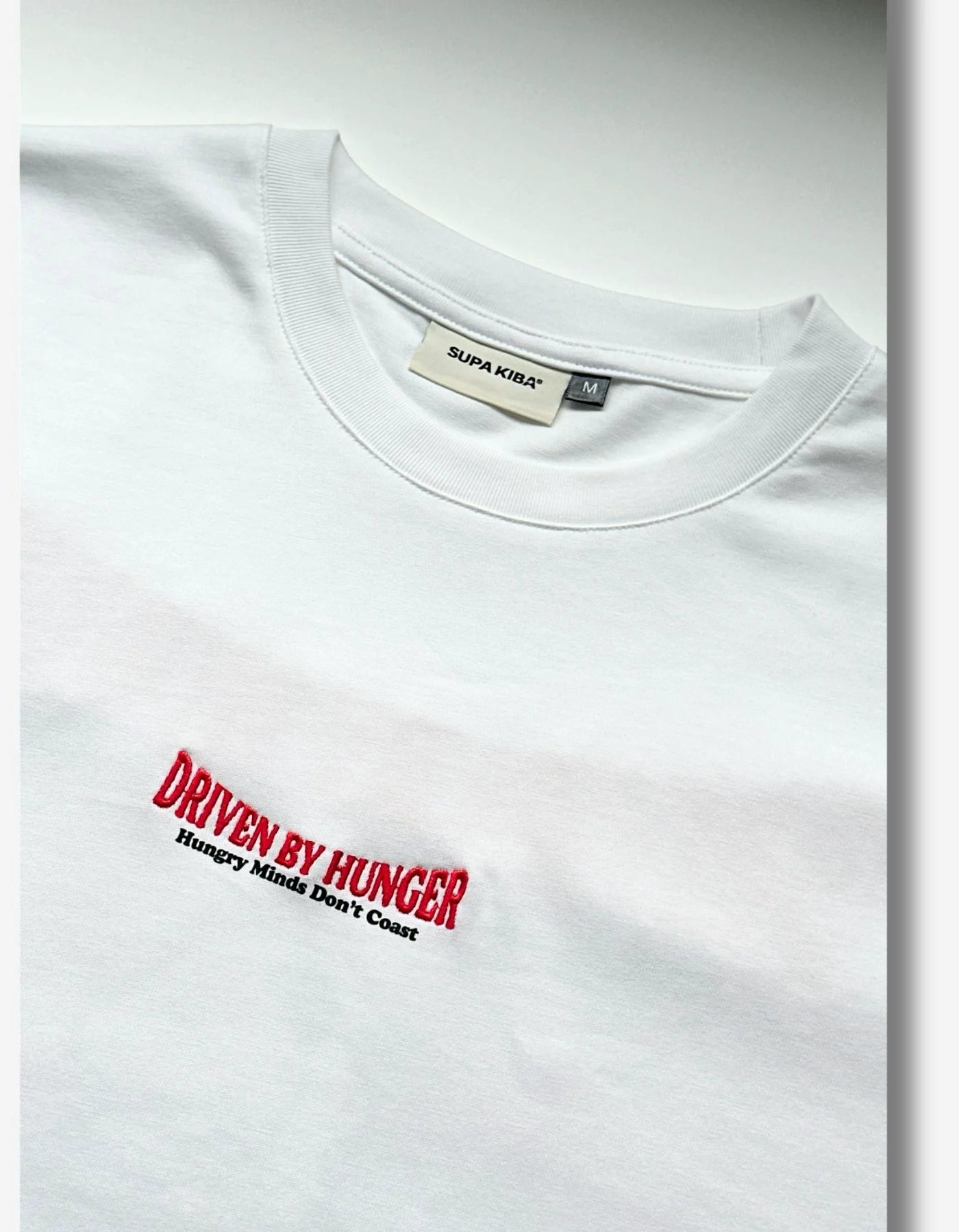 DRIVEN BY HUNGER — Boxy Tee